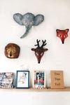 Kid's room with paper mache animal heads