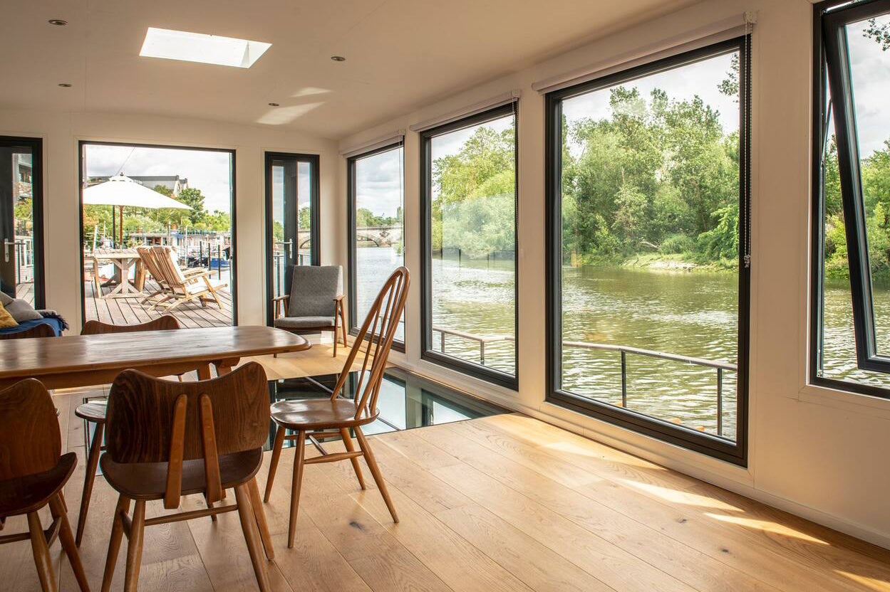 houseboat dining room with picture windows