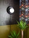 black plated wall sconce