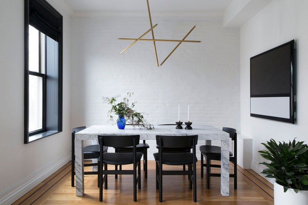 dining room with sculptural light fixture