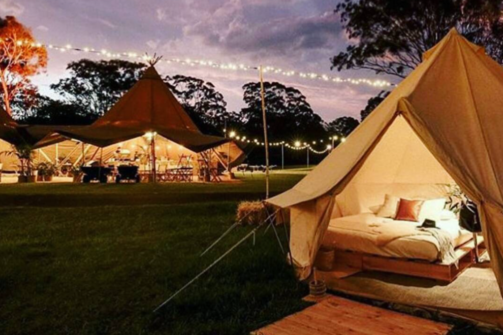 glamping tent with bed inside