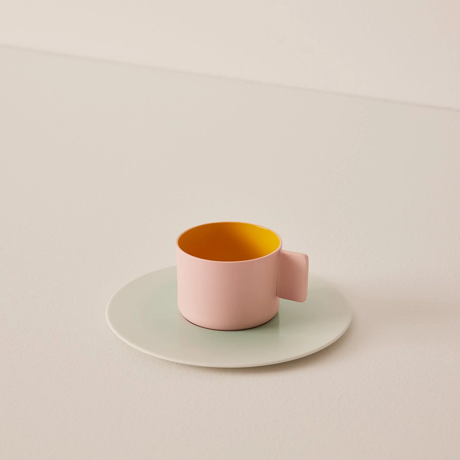 Pink and yellow coffee mug
