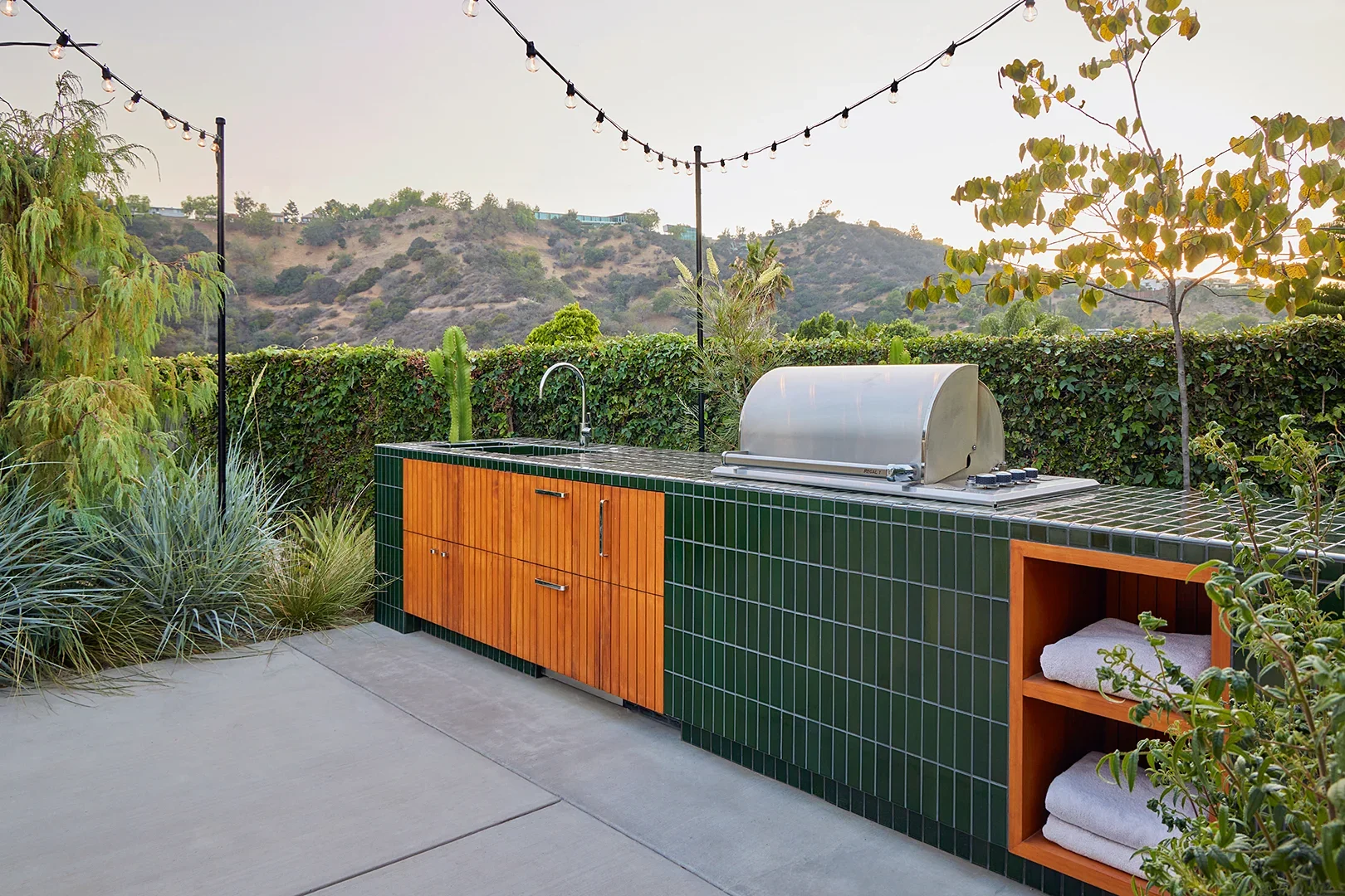 green tiled outdoor kitchen