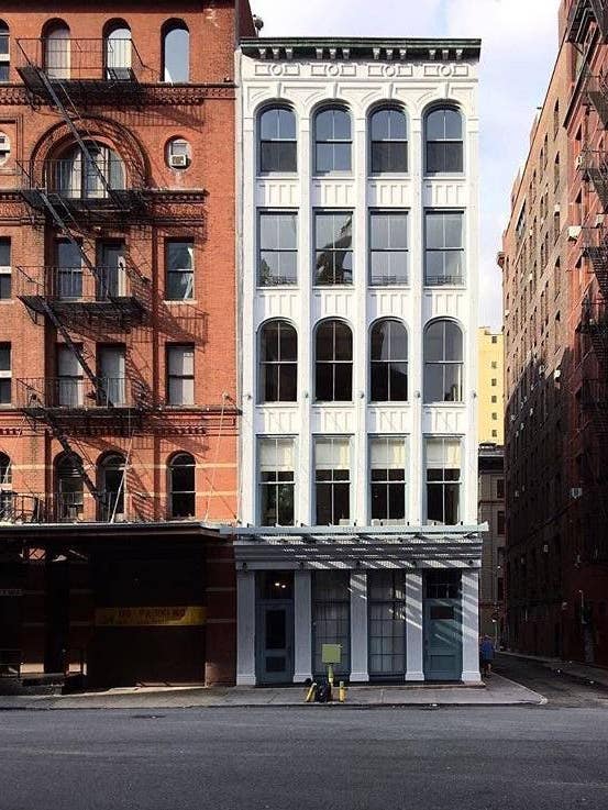 best instagram accounts white nyc building next to red brick