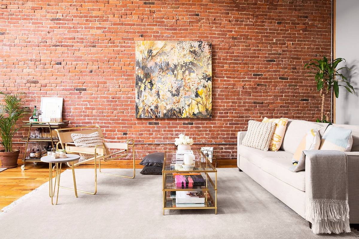 uprise art  brick wall in living room