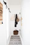 Renovating a Bathroom Turned This Apartment Into a Dream Home entryway