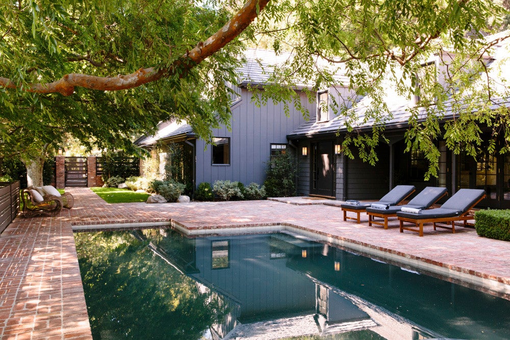 Luxury Outdoor Brick Patio with Pool