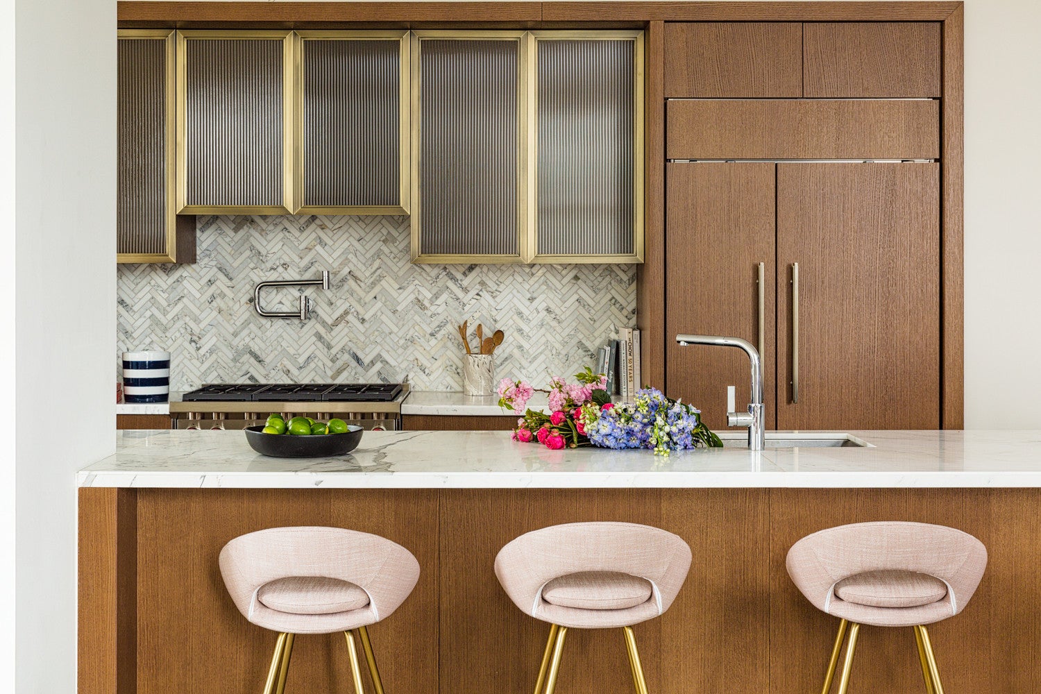 wood kitchen counter with pink stools