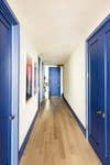 blue-purple painted trim hallway