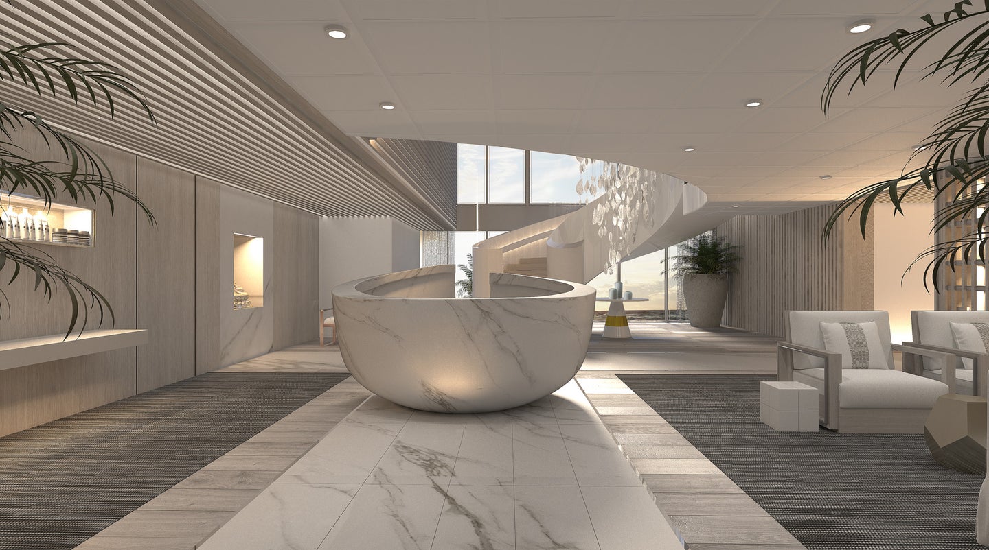 A rendering of the spa entrance with a jaw-dropping marble desk. 