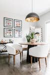 Every fixture in <a href="https://www.domino.com/content/modern-global-inspiration-north-carolina-home-tour/">this eclectic North Carolina home</a>&mdash;from the matte black pendant over the kitchen dining table to the acrylic starburst stunner in the office&mdash;is on trend.&nbsp;