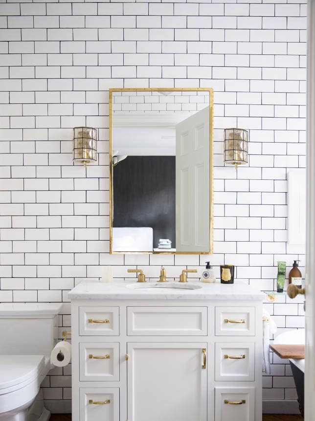 West Village Townhouse Alison Cayne Gold and White Bathroom