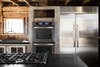 Black and Gray and Silver and Wood Kitchen