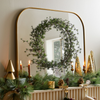 Sparse Pine Wreath & Garlandon brass mirror