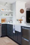 navy-cabinets-white-open-shelves-kitchen