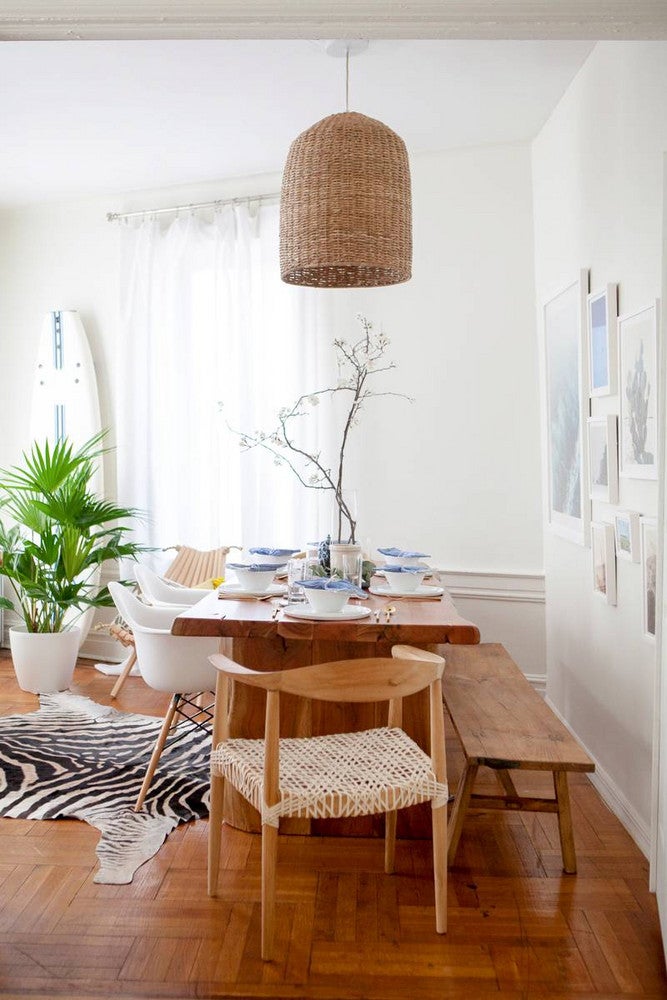 dining room makeover with wood dining table and rattan chandelier