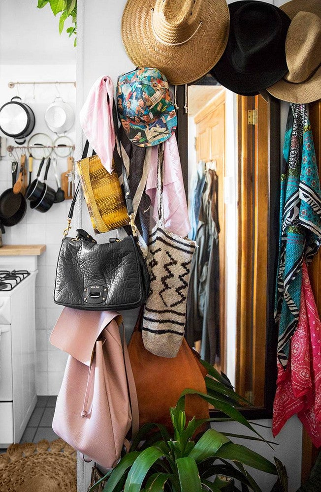 NYC Apartment Of Brooke Lucas Of The Wild Bunch Bags And Hats In Closet