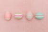 pastel Easter eggs with stripes in different widths