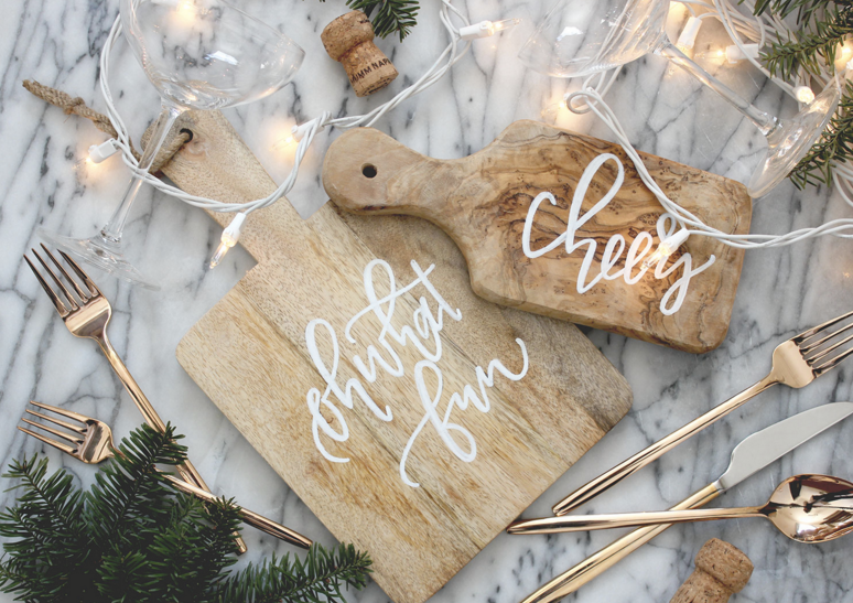 cutting boards with white writing