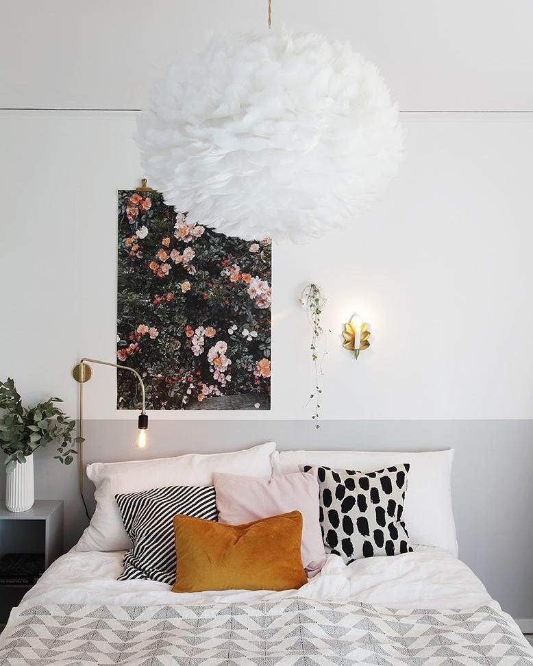 15 Clever Ways to Fill the Empty Space Above Your Bed