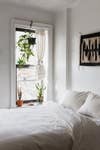 whitewashed minimalist bedroom
