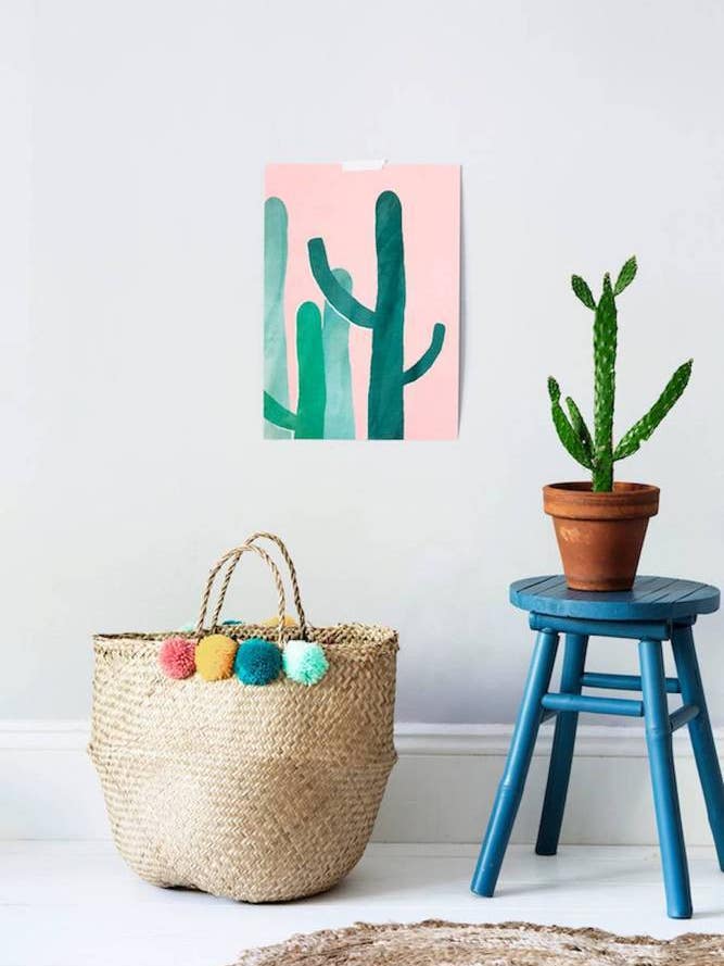 inexpensive home decor ideas pom pom basket in a white room