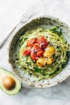 12 Simple Avocado Recipes That Aren't Toast- burst tomato and zucchini spaghetti with avocado sauce