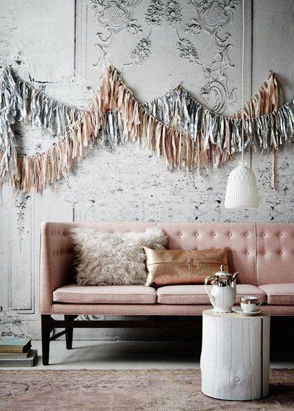 gray-wall-pink-sofa-tassels