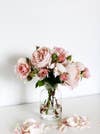 Easy Spring Centerpieces pink peonies in bottle