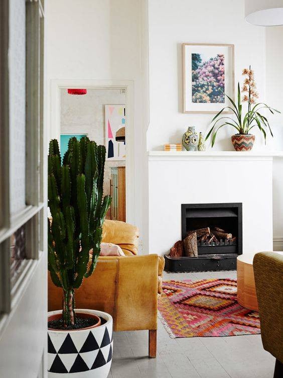 mantel decorating ideas for spring boho chic living room with botanical mantel art