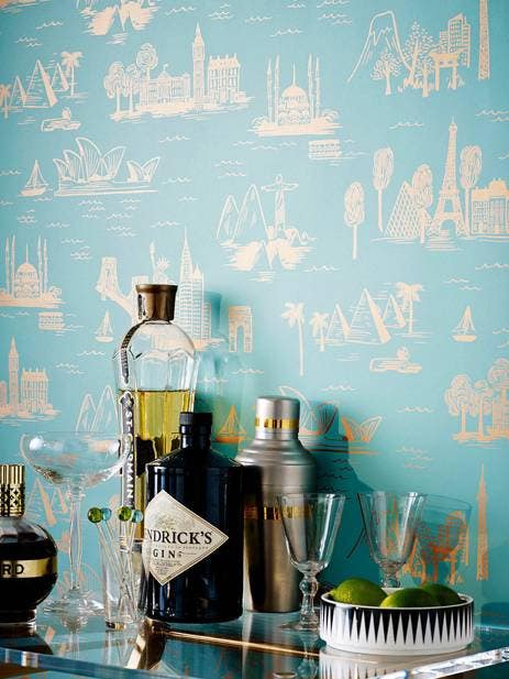 toile prints blue and beige toile wallpaper behind bar