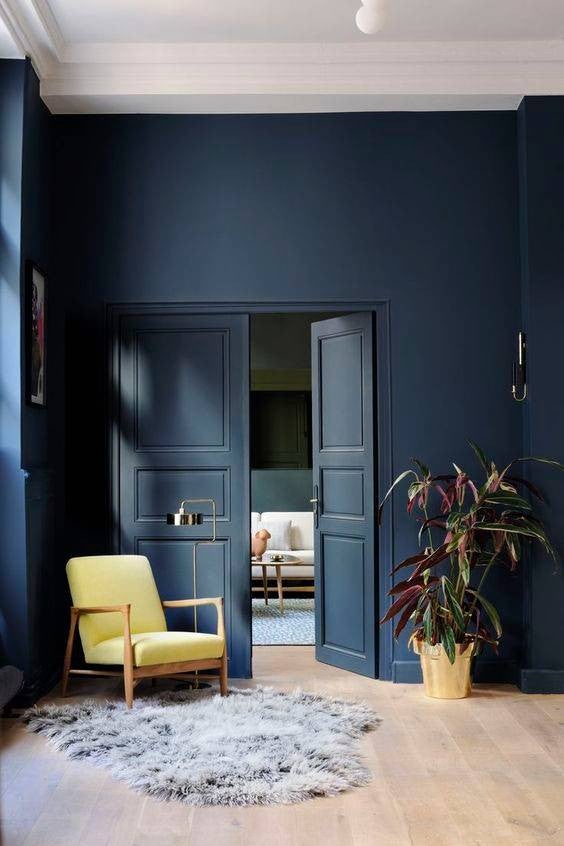 home paint ideas navy entry with yellow chair