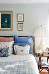 pillow shapes bed with pink and blue pillows