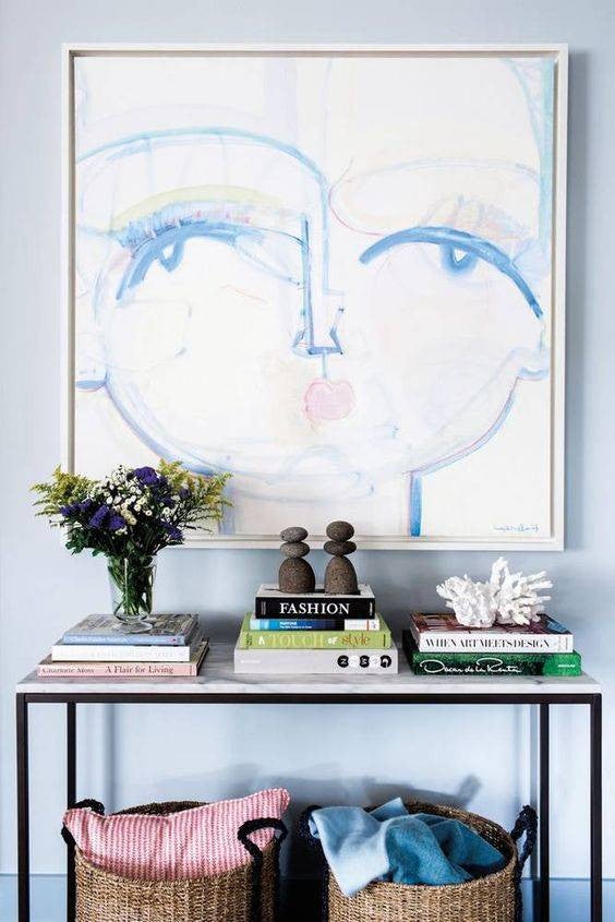 entryway design entryway with console and blue woman painting