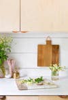 easy kitchen updates  shiplap backsplash with hanging cutting board