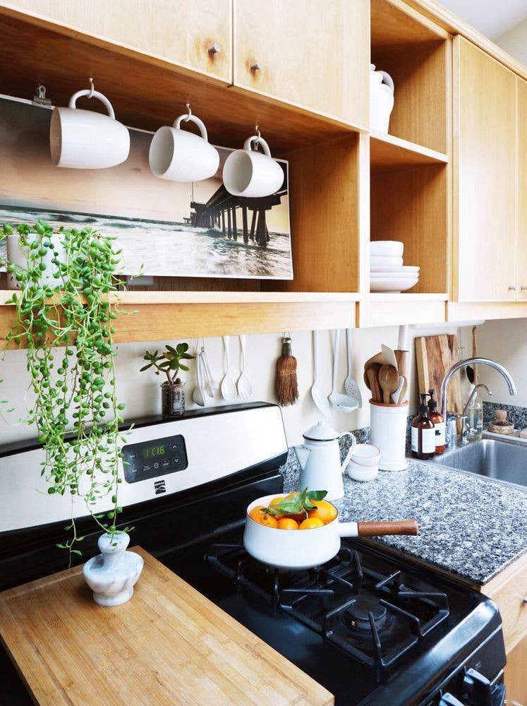easy kitchen updates  black and wood kitchen with plant