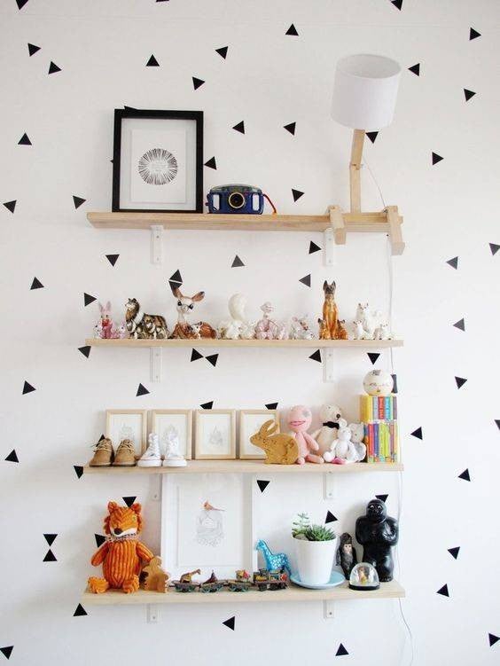kids room design black and white polka dot wallpaper and mounted shelves