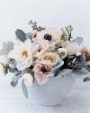 Easy Spring Centerpieces delicate and feminine floral arrangement