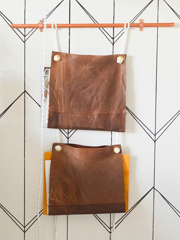diy leather hanging magazine rack by vintage revivals