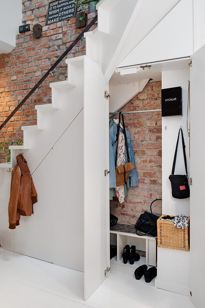 How To Organize The Cupboard Under Your Stairs | domino