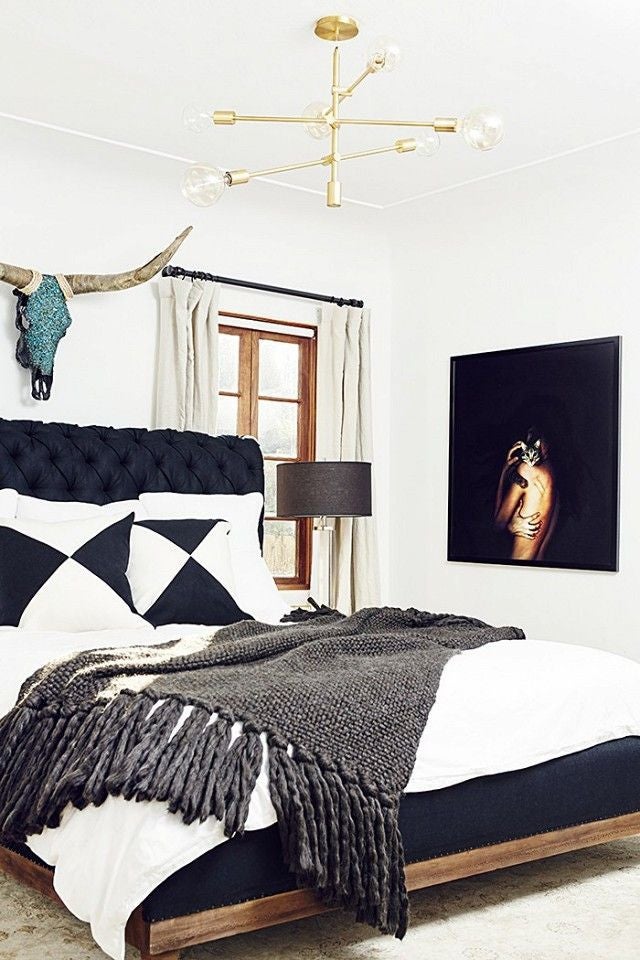 black, white, and gold bedroom