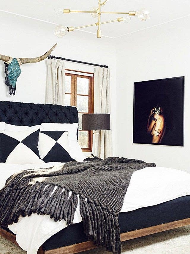 black, white, and gold bedroom