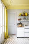 white-kitchen-yellow-ceiling
