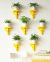 hallway-wall-ideas-yellow-mounted-planters