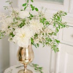 white home decor white and green flowers on a table