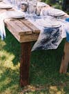 4th of July summer holiday table decorations wood table with blue runner