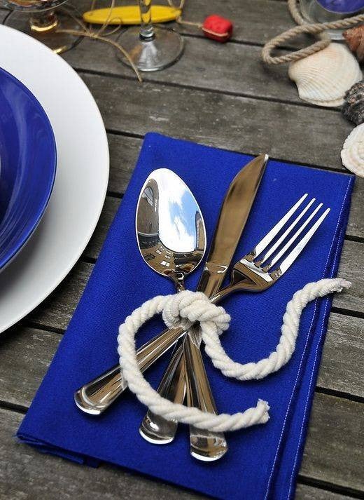 4th of July summer holiday table decorations blue napkin with forks and knives