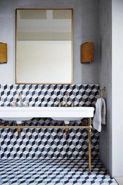 geometric tile black white and gray block tile in bathroom