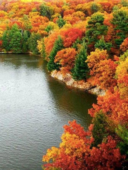 fall travel destinations foliage on a lake