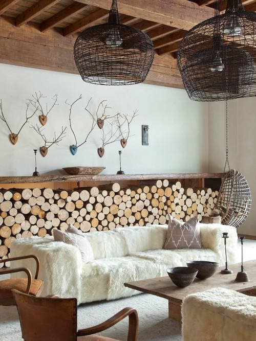 rustic interiors white living room with antlers on wall